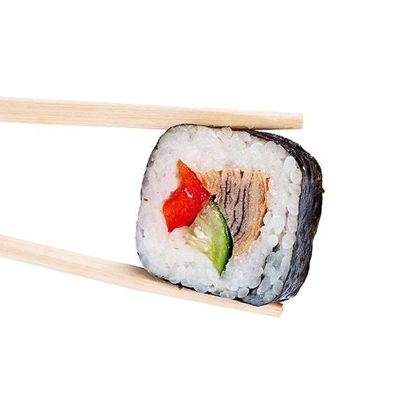 A sushi roll with cucumber and peppers on chopsticks.